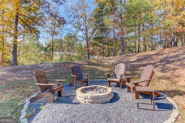 view of patio featuring an outdoor fire pit