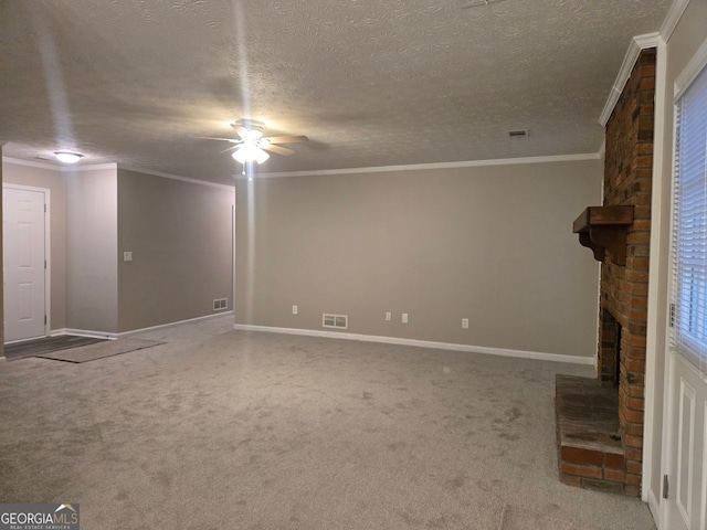 unfurnished living room featuring crown molding, a textured ceiling, and carpet floors