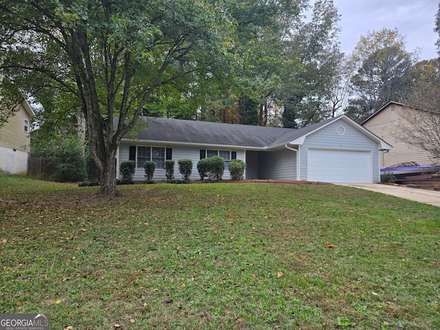 single story home featuring a garage and a front yard