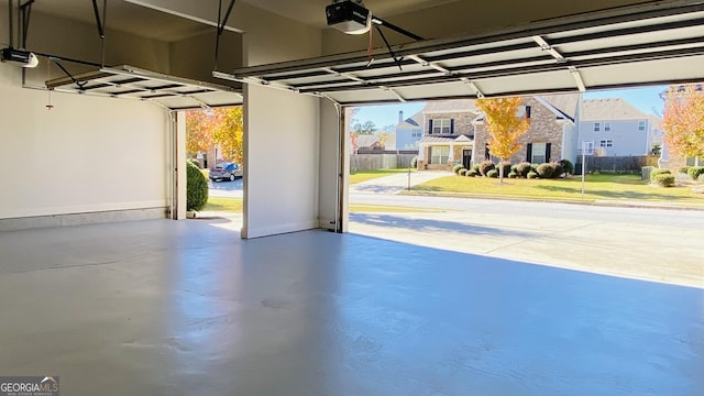 garage featuring a garage door opener