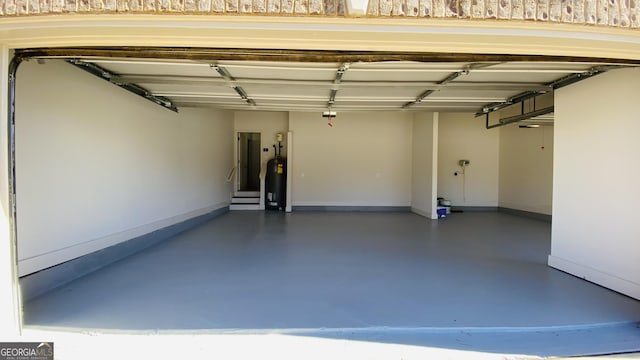 garage featuring water heater