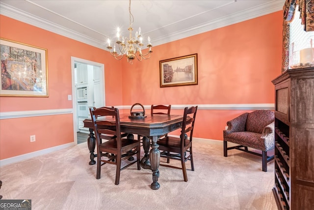 dining area featuring light colored carpet, ornamental molding, and a chandelier