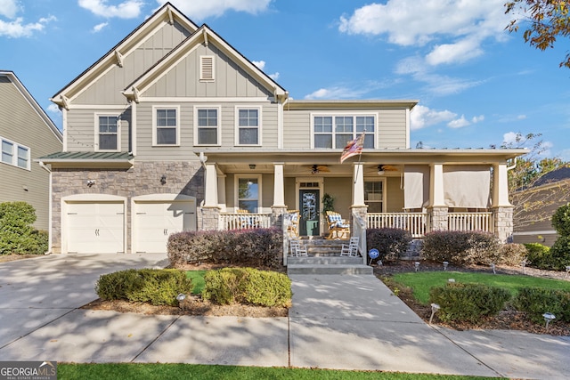 craftsman house with a porch and a garage