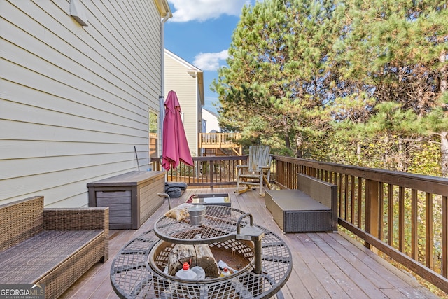 deck with an outdoor hangout area