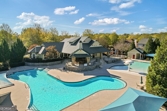 pool featuring a patio