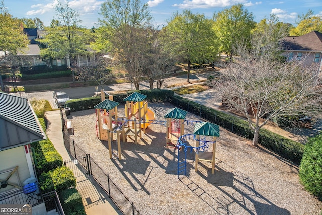 surrounding community featuring playground community and fence