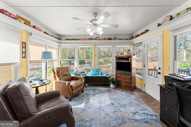 sunroom / solarium with ceiling fan