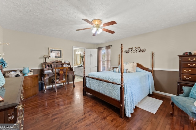 bedroom with ensuite bath, ceiling fan, dark hardwood / wood-style flooring, and a textured ceiling