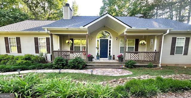 view of front of house with covered porch