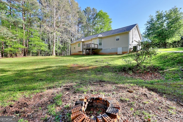 view of yard with a deck