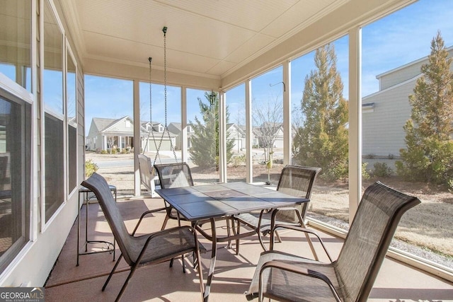 sunroom featuring a healthy amount of sunlight