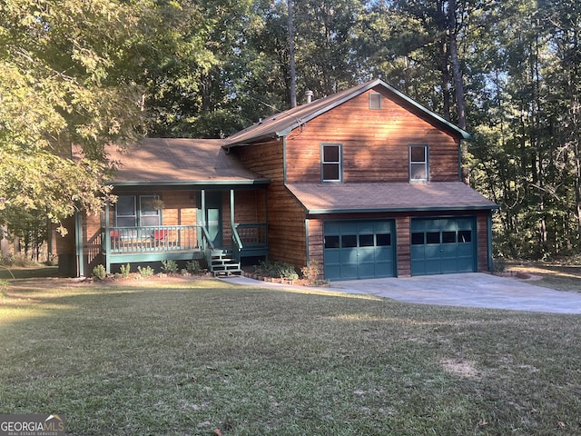 view of front facade featuring covered porch, a garage, and a front lawn