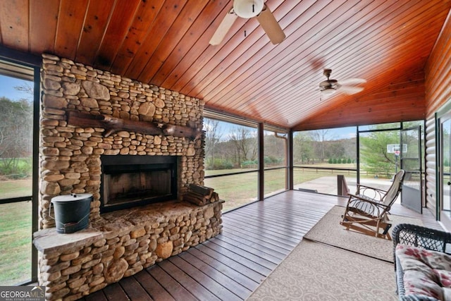 sunroom / solarium with lofted ceiling and wood ceiling