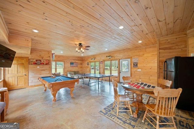 game room with a wealth of natural light, wooden ceiling, and wood walls