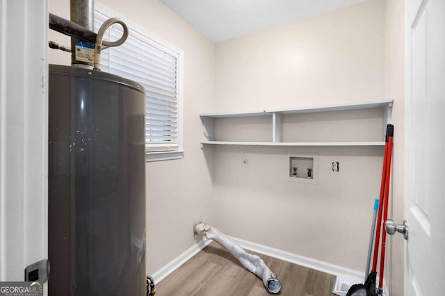 laundry room featuring hardwood / wood-style floors, electric dryer hookup, washer hookup, and water heater