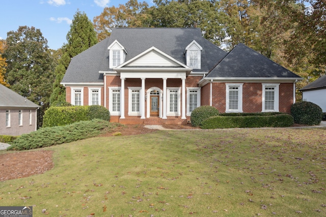 view of front of home with a front yard