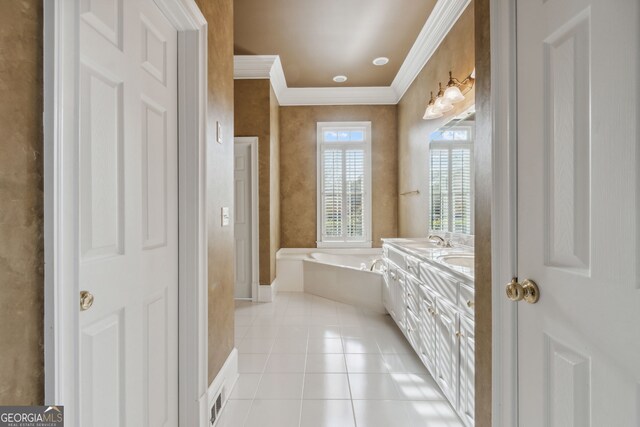 bathroom featuring tile patterned flooring, a bath, vanity, and ornamental molding