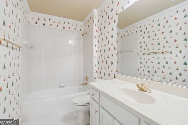 full bathroom with vanity, tile patterned floors, crown molding, tiled shower / bath, and toilet