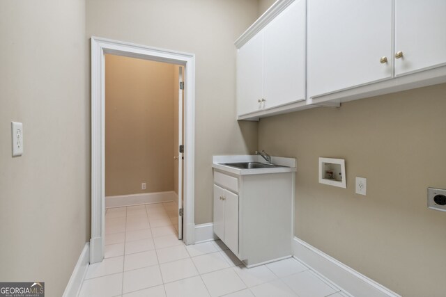 washroom featuring electric dryer hookup, cabinets, sink, and hookup for a washing machine