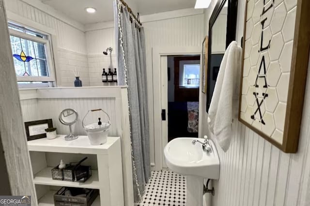 bathroom featuring walk in shower