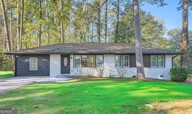 ranch-style house with a front yard