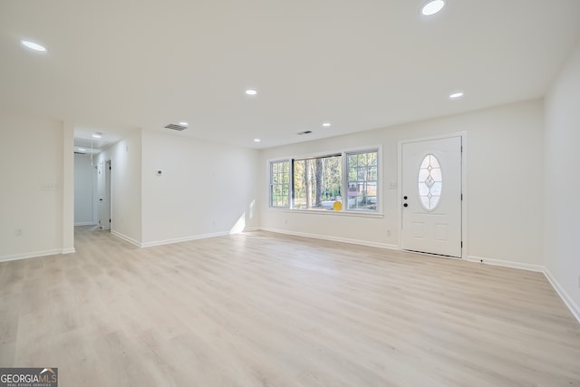 foyer entrance featuring light hardwood / wood-style flooring