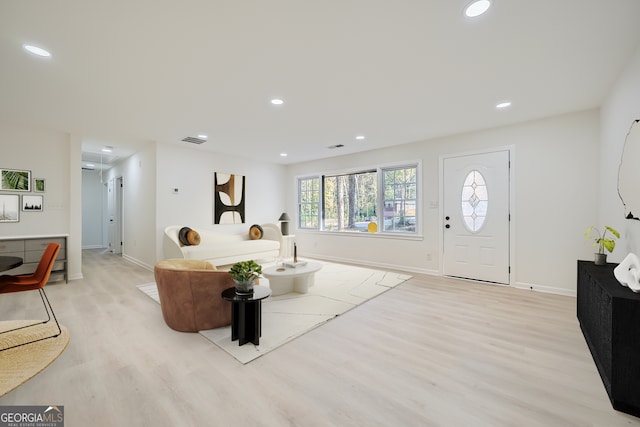 living room with light hardwood / wood-style floors