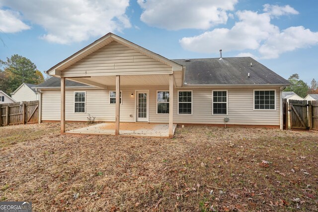 rear view of property with a patio