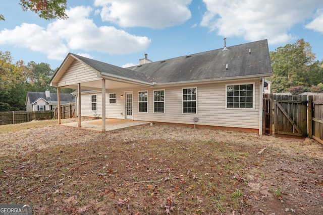 rear view of house featuring a patio area