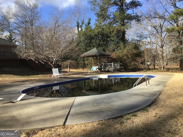 view of swimming pool featuring a gazebo