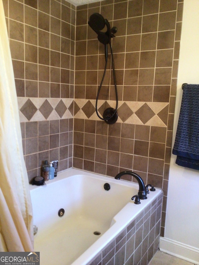 bathroom featuring tiled bath