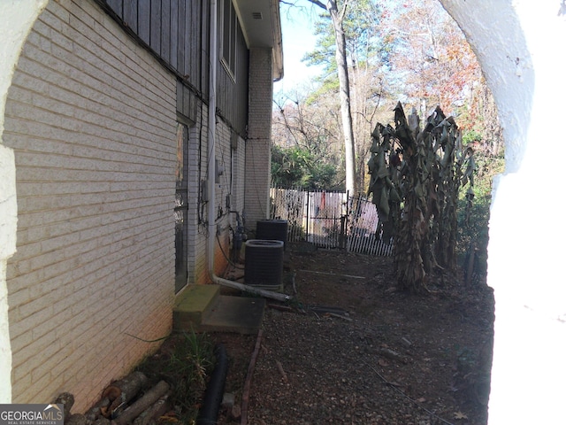 view of home's exterior featuring central air condition unit