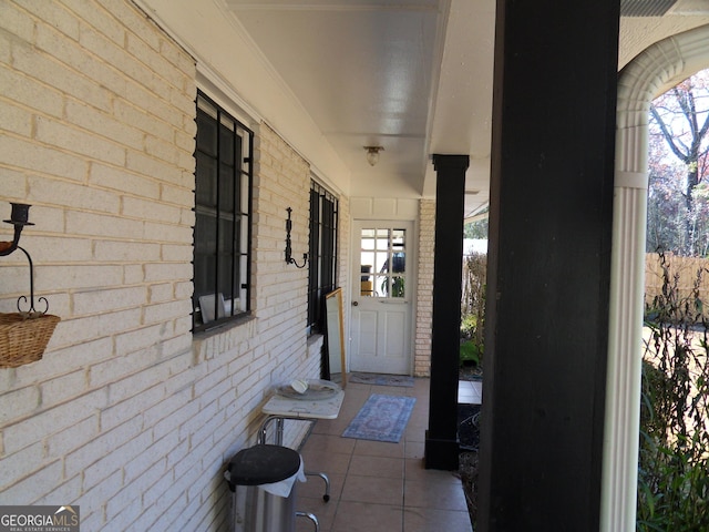 doorway to property with a porch