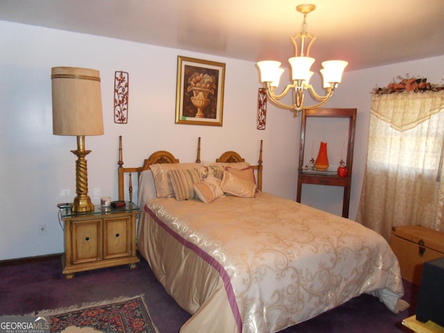 bedroom featuring an inviting chandelier