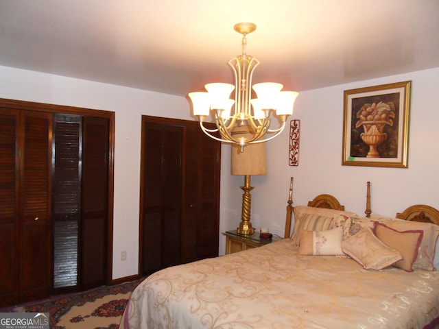 bedroom with a notable chandelier