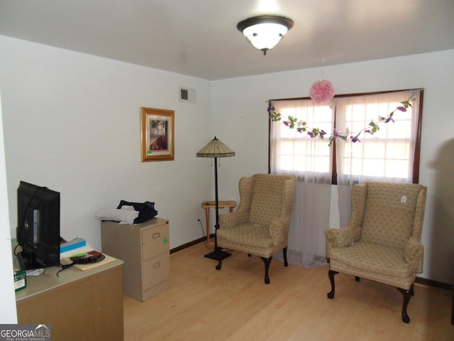 living area featuring light hardwood / wood-style flooring