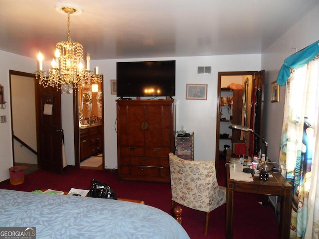 bedroom with an inviting chandelier