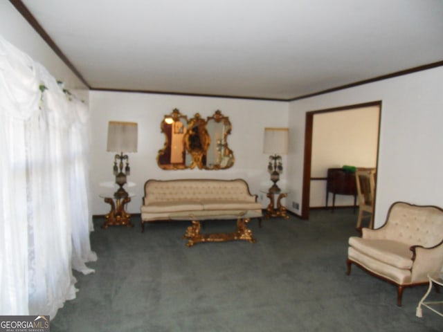 sitting room featuring crown molding and dark colored carpet