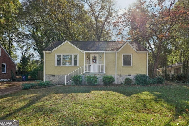 view of front of home with a front yard