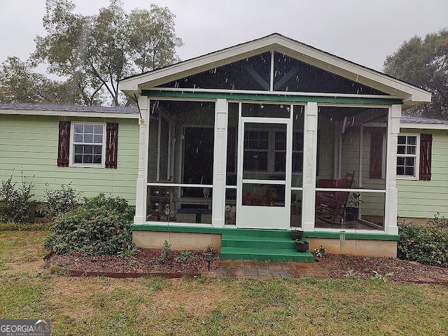 exterior space with a sunroom