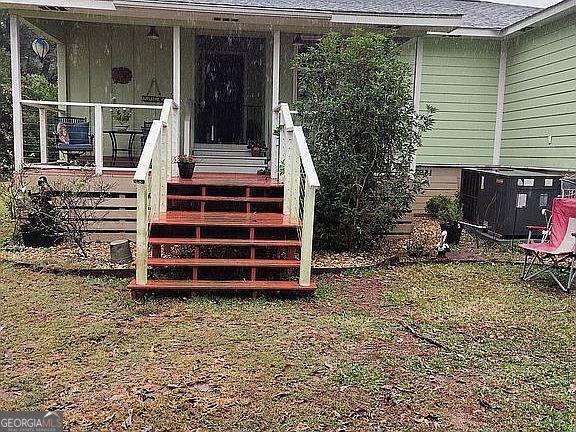 property entrance with cooling unit