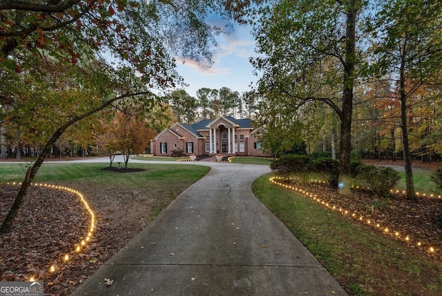 ranch-style house with a yard