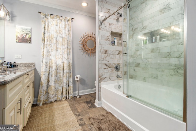 full bathroom featuring vanity, toilet, combined bath / shower with glass door, and crown molding