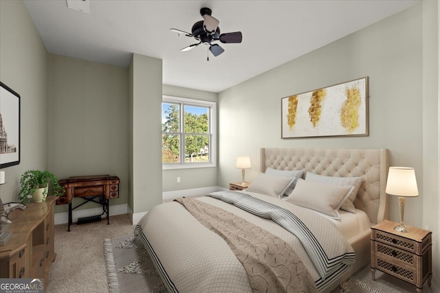 empty room featuring ceiling fan and carpet floors