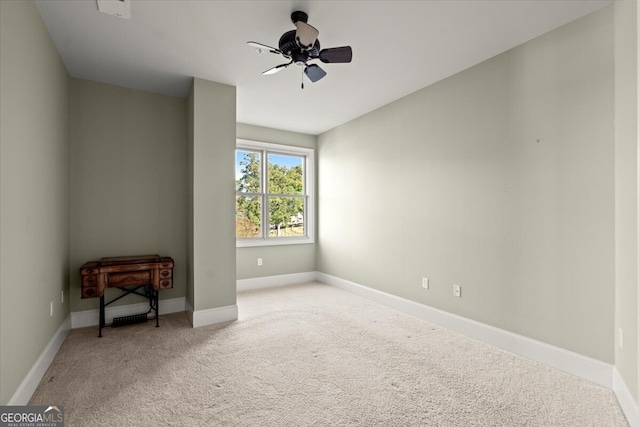 bedroom featuring light carpet and ceiling fan