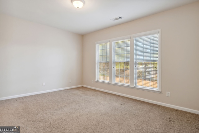 view of carpeted spare room