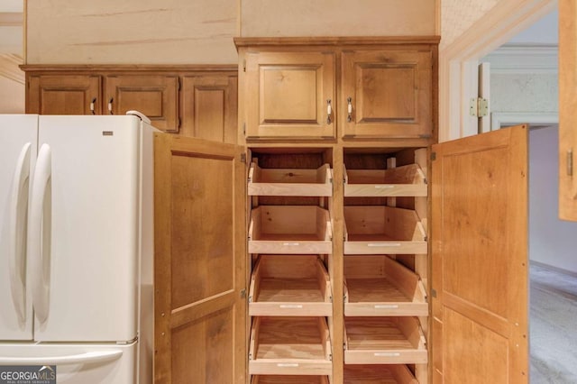 interior space featuring white fridge