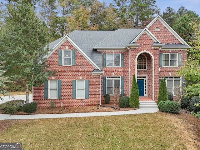 view of front property with a front yard