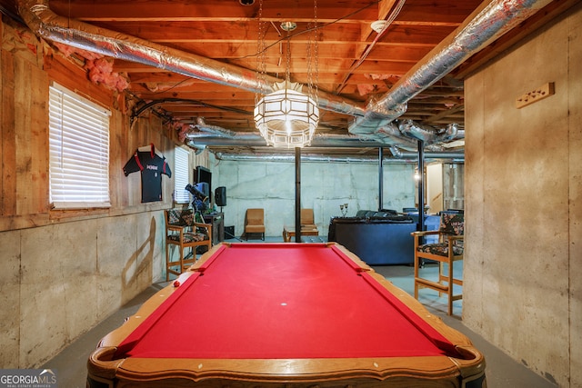 game room with concrete floors