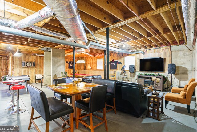 dining area with concrete floors